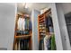 Organized walk-in closet with custom shelving and ample storage for clothing and accessories at 1058 Piedmont Ne Ave # 302, Atlanta, GA 30309