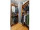 Spacious walk-in closet with custom built-in shelving and hanging rods at 1058 Piedmont Ne Ave # 302, Atlanta, GA 30309