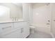 Modern bathroom with white vanity, subway tile, and hexagon floor tile at 131 Wards Crossing Way # 19, Johns Creek, GA 30022