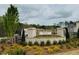 Elegant community entrance sign, Ward's, brick pillars, landscaping, and wrought-iron fence at 131 Wards Crossing Way # 19, Johns Creek, GA 30022