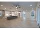 Open concept kitchen features island, stainless steel appliances, and white shaker cabinets at 131 Wards Crossing Way # 19, Johns Creek, GA 30022