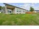 House backyard with grassy area and wooden fence at 7788 Richmond Trl, Fairburn, GA 30213