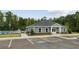 Community clubhouse with parking and pool access at 7788 Richmond Trl, Fairburn, GA 30213