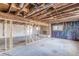 Unfinished basement with framing and painted walls at 143 Longview Rd, Fayetteville, GA 30214