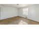 Bright bedroom with neutral walls and carpet flooring at 143 Longview Rd, Fayetteville, GA 30214