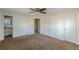 Large bedroom with ceiling fan and ensuite bathroom at 143 Longview Rd, Fayetteville, GA 30214