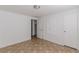 Empty bedroom with tile floor and closet at 143 Longview Rd, Fayetteville, GA 30214