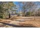 Brick ranch house with covered porch and large yard at 143 Longview Rd, Fayetteville, GA 30214