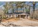 Brick ranch house with covered porch and large yard at 143 Longview Rd, Fayetteville, GA 30214