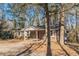 Brick ranch house with covered porch and large yard at 143 Longview Rd, Fayetteville, GA 30214