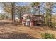 Brick house with a screened porch and large backyard at 143 Longview Rd, Fayetteville, GA 30214