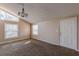 Living room with vaulted ceiling and window at 143 Longview Rd, Fayetteville, GA 30214