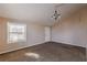Spacious living room with carpeted floors at 143 Longview Rd, Fayetteville, GA 30214