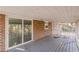 Spacious screened porch with wooden deck and sliding glass door access at 143 Longview Rd, Fayetteville, GA 30214