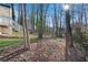 Yard with trees, and stairs attached to home at 3251 Stoney Acres Nw Dr, Kennesaw, GA 30152