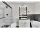 Modern bathroom featuring a walk-in shower, soaking tub, and granite vanity at 3251 Stoney Acres Nw Dr, Kennesaw, GA 30152