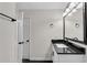 Bathroom featuring black hardware and granite countertops at 3251 Stoney Acres Nw Dr, Kennesaw, GA 30152