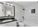 Bathroom featuring black hardware and subway tile shower at 3251 Stoney Acres Nw Dr, Kennesaw, GA 30152