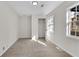 This bedroom has neutral paint and carpet, with a door to the closet at 3251 Stoney Acres Nw Dr, Kennesaw, GA 30152