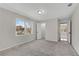Bright bedroom with neutral walls and carpet at 3251 Stoney Acres Nw Dr, Kennesaw, GA 30152