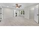Large bedroom with carpet, ceiling fan, ensuite bathroom, and walk-in closet at 3251 Stoney Acres Nw Dr, Kennesaw, GA 30152