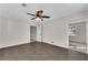 This bedroom has neutral paint and a ceiling fan at 3251 Stoney Acres Nw Dr, Kennesaw, GA 30152