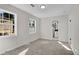This bedroom has neutral paint and carpet, with an attached bathroom at 3251 Stoney Acres Nw Dr, Kennesaw, GA 30152