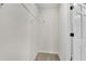 Walk-in closet featuring a metal shelf and neutral carpet at 3251 Stoney Acres Nw Dr, Kennesaw, GA 30152