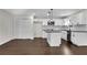 Modern kitchen with white cabinets, stainless steel appliances, and center island at 3251 Stoney Acres Nw Dr, Kennesaw, GA 30152