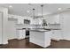 Modern kitchen with white cabinets, stainless steel appliances, and granite countertops at 3251 Stoney Acres Nw Dr, Kennesaw, GA 30152
