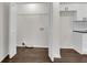 Laundry room with washer and dryer hookups and folding counter near custom cabinets at 3251 Stoney Acres Nw Dr, Kennesaw, GA 30152
