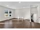 Bright living room with hardwood floors and ample natural light at 3251 Stoney Acres Nw Dr, Kennesaw, GA 30152