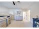 Bright bedroom with neutral carpet, bunk beds, and a gray dresser showcasing ample storage and a stylish, minimalist design at 4973 Concert Ln, Marietta, GA 30066