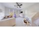 Bright bedroom featuring stuffed animals, play tent, neutral carpet, and a ceiling fan offering a playful and inviting atmosphere at 4973 Concert Ln, Marietta, GA 30066