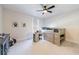 This bedroom features a wooden lofted bed with a built-in desk and drawers and a ceiling fan at 4973 Concert Ln, Marietta, GA 30066