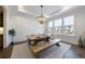 Formal dining room with farmhouse table and bench at 4973 Concert Ln, Marietta, GA 30066