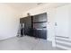 Garage features wall-mounted storage cabinets, a work bench, and an epoxy floor at 4973 Concert Ln, Marietta, GA 30066
