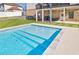 Inviting, rectangular pool with tiled steps and a large patio area at 4973 Concert Ln, Marietta, GA 30066