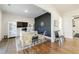Home office with built-in shelving and hardwood floors at 4973 Concert Ln, Marietta, GA 30066