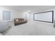 Spacious home theater room with a projector screen, comfortable seating and plush carpeting at 4973 Concert Ln, Marietta, GA 30066