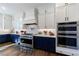 A gourmet kitchen featuring stainless steel appliances, custom cabinets, and ample counter space for cooking at 4973 Concert Ln, Marietta, GA 30066
