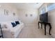Cozy living room with a comfortable white sofa, blue pillows, and stylish decor at 4973 Concert Ln, Marietta, GA 30066