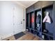 Mudroom features built-in storage compartments with coat racks and shelving for shoes and other items at 4973 Concert Ln, Marietta, GA 30066