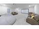 Spacious bedroom with a large window, ceiling fan, and plenty of room for furniture at 4973 Concert Ln, Marietta, GA 30066