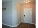 Light and bright entryway with hardwood floors at 2646 Calvary Dr, Hampton, GA 30228