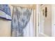 Bathroom with shower/tub combo and patterned shower curtain at 709 Chapman St, Jonesboro, GA 30238