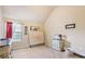 Bedroom with vaulted ceilings, a tufted headboard, and a dresser at 709 Chapman St, Jonesboro, GA 30238