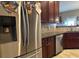 Modern kitchen with stainless steel appliances and dark wood cabinets at 709 Chapman St, Jonesboro, GA 30238