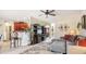 Open living room with kitchen view, sectional sofa and large TV at 709 Chapman St, Jonesboro, GA 30238