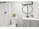 Bathroom showcasing a toilet, sink, and walk-in shower, complete with modern fixtures at 1120 Starline Se Dr, Smyrna, GA 30080